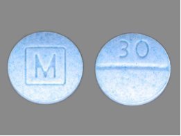 Front and back of counterfeit Percocet pills containing fentanyl
