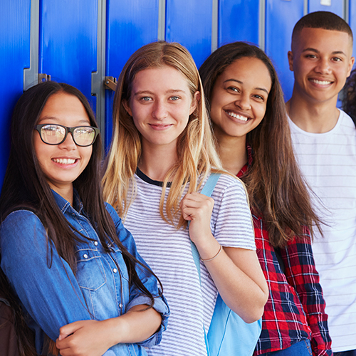 Photo of students in front of lockers