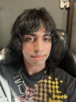 Student in black and yellow shirt